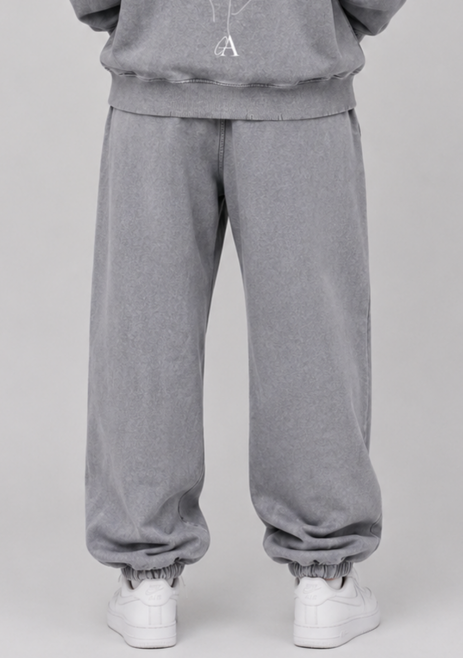 Through Her Light Sweatpants